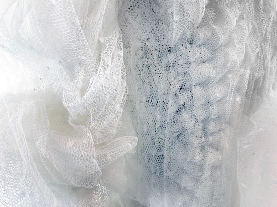 Close-up of silver-thread cloud embroidery on "Altostratus" coat
